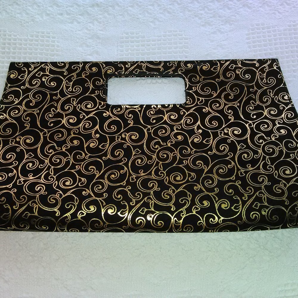 Charming Charlie black and gold handbag